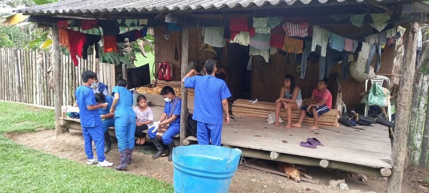 Indigenous nursing technicians go house-to-house in Puerto Nariño, two hours downriver from Puerto Leguizamo, to do sample testing for malaria